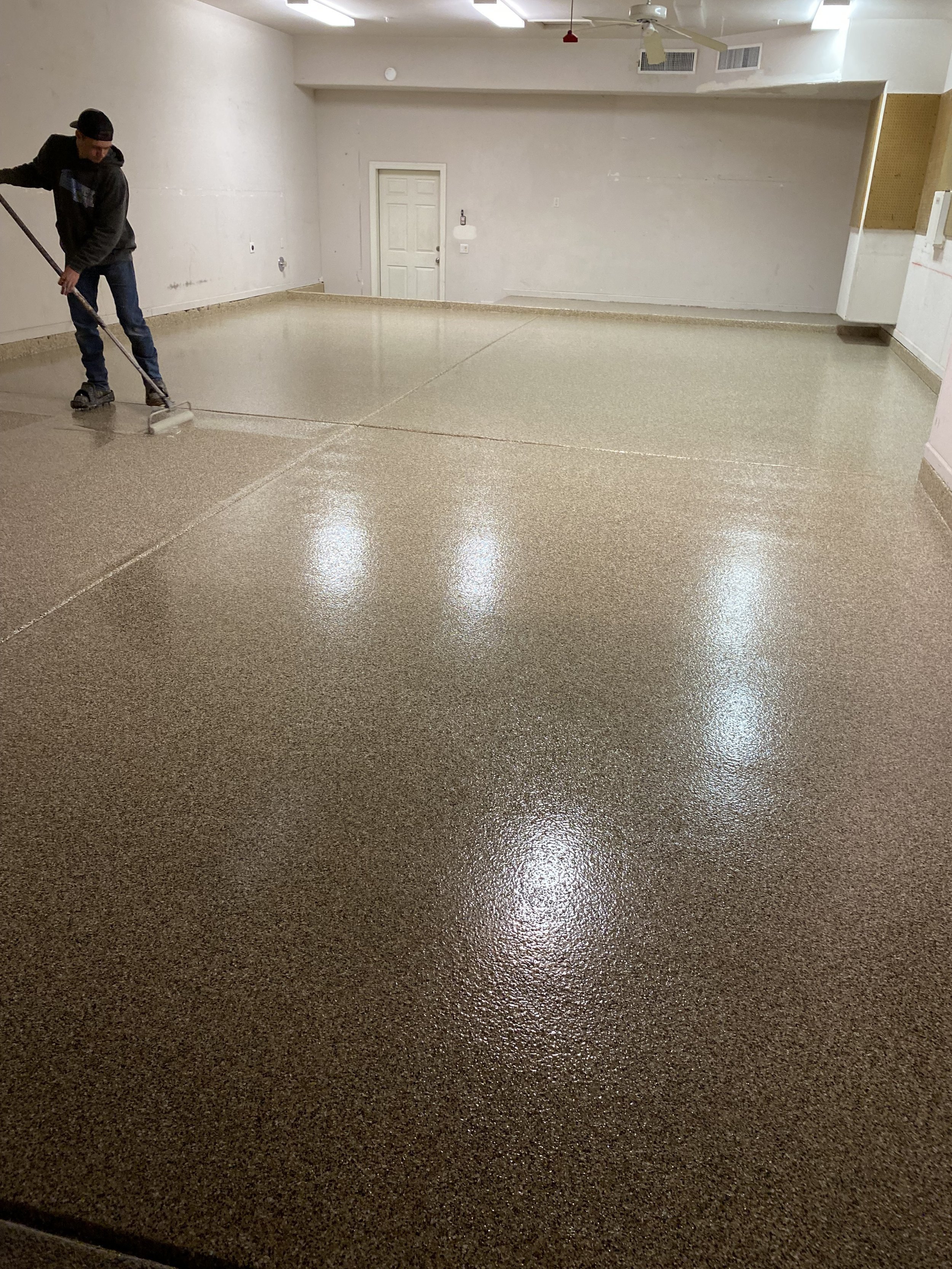 Sun Valley Epoxy crew installing a floor