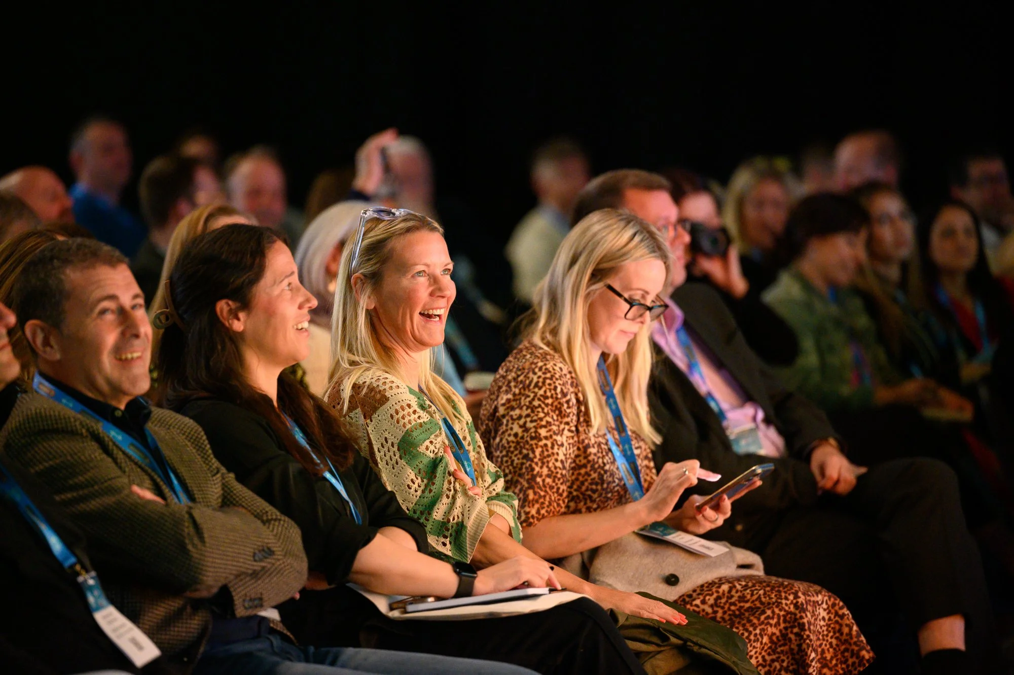 Conference audience listening to a session