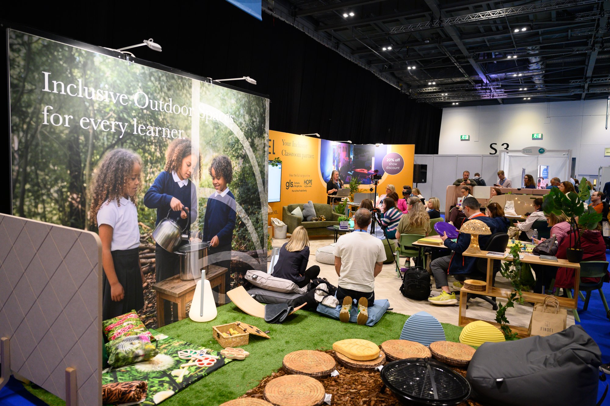 Visitors exploring inclusive classroom design at the Schools and Academies Show