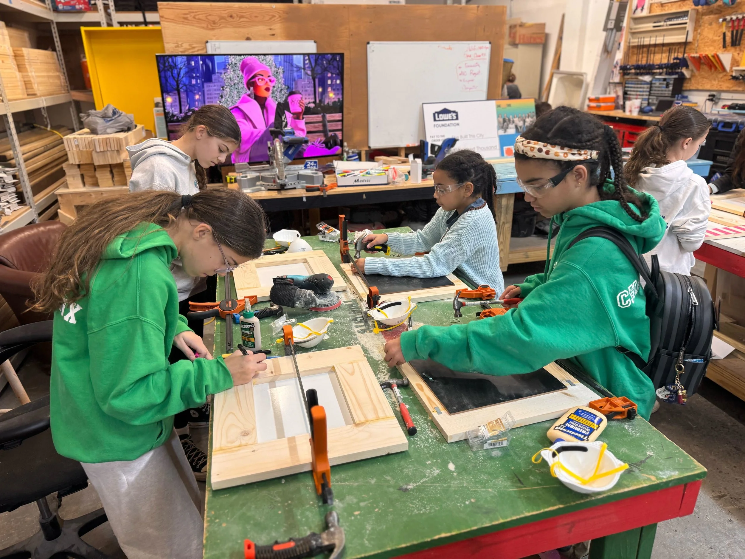 Youth engaged in skilled trades pathway programming