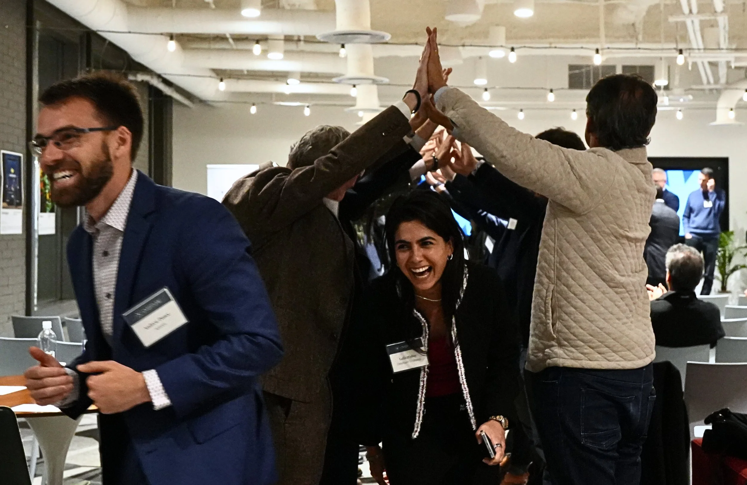 Attendees celebrating at the 2025 Overture AGM