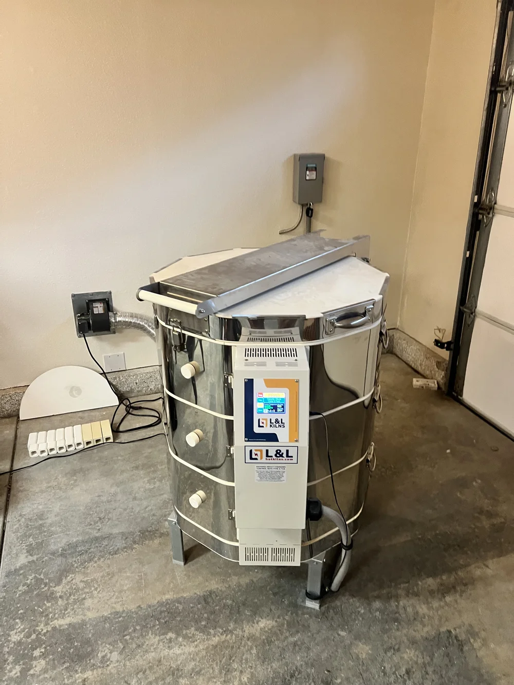 The electric kiln in the studio