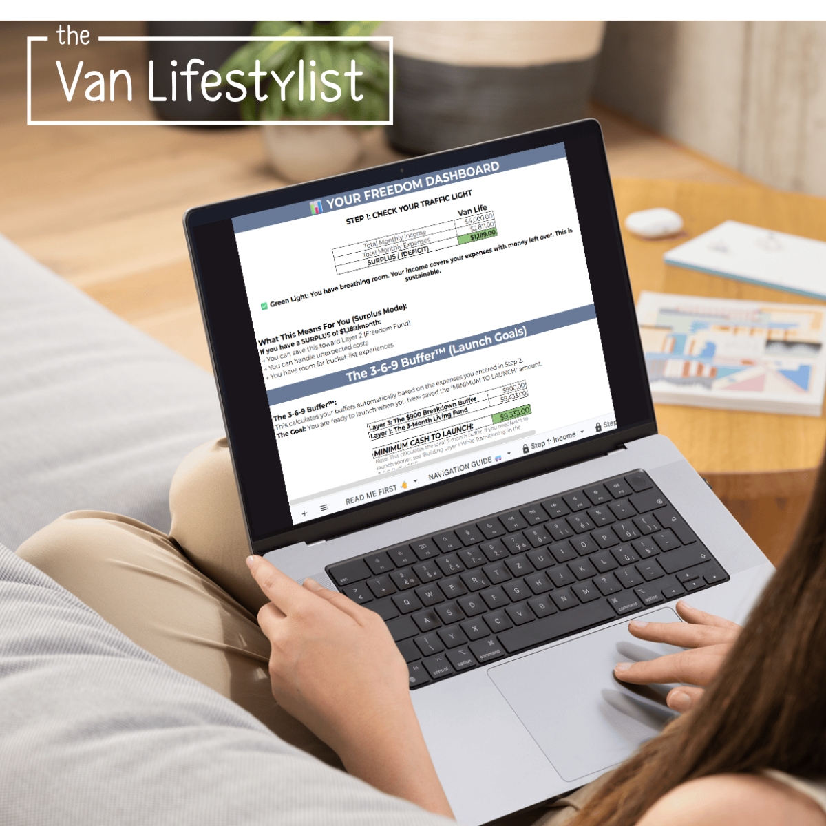Woman using The Van Life Money Calculator spreadsheet on laptop