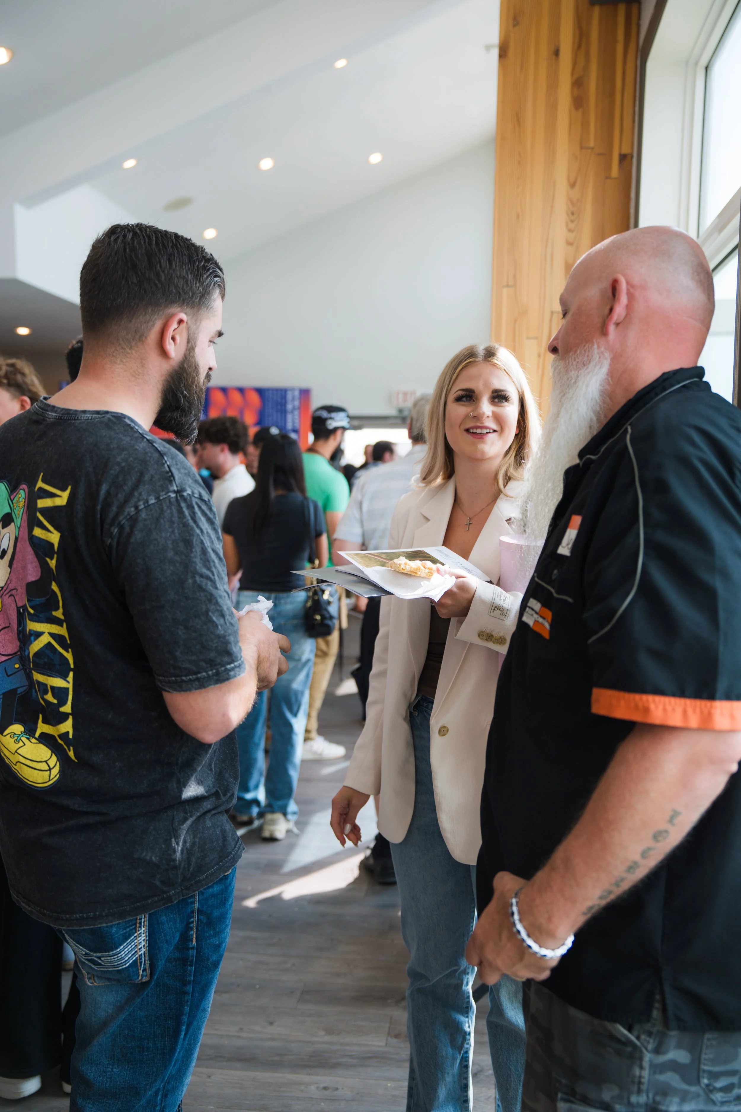 People in friendly conversation at Journey Church Calgary