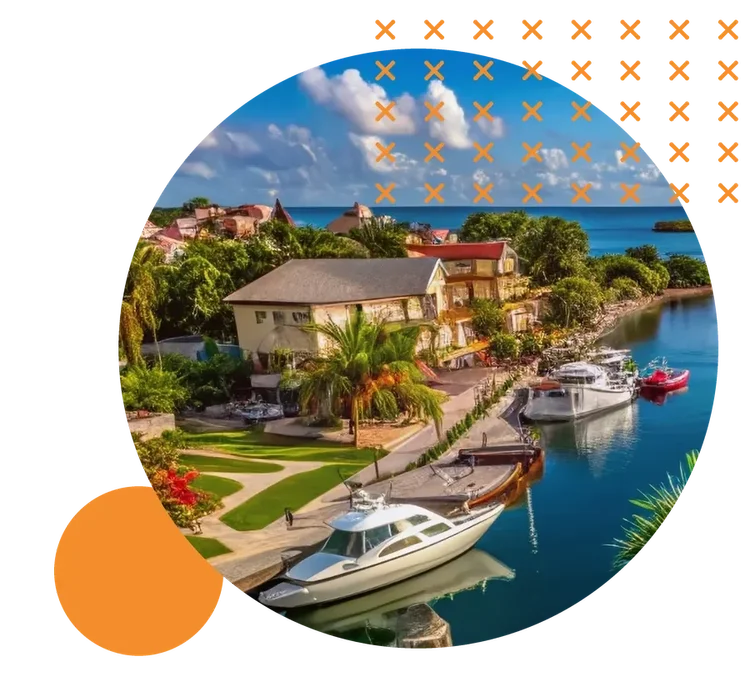 Waterfront homes and boats docked along a sunny Florida canal