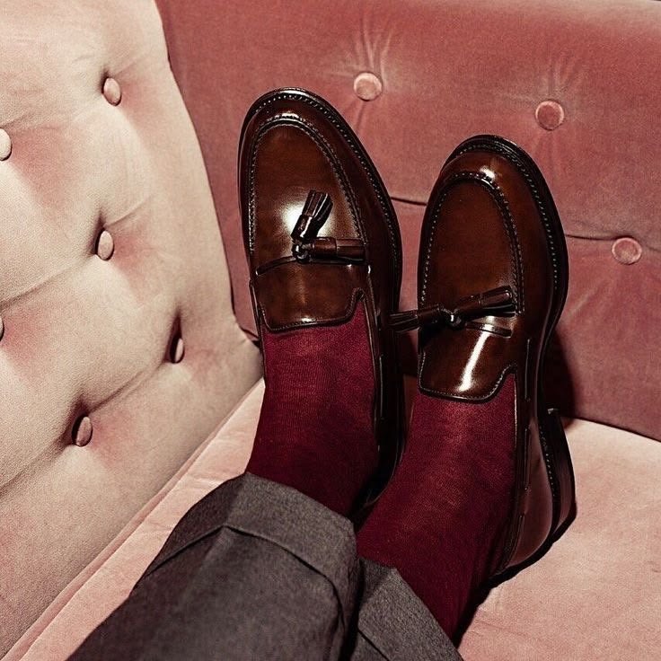 Polished brown loafers with maroon socks