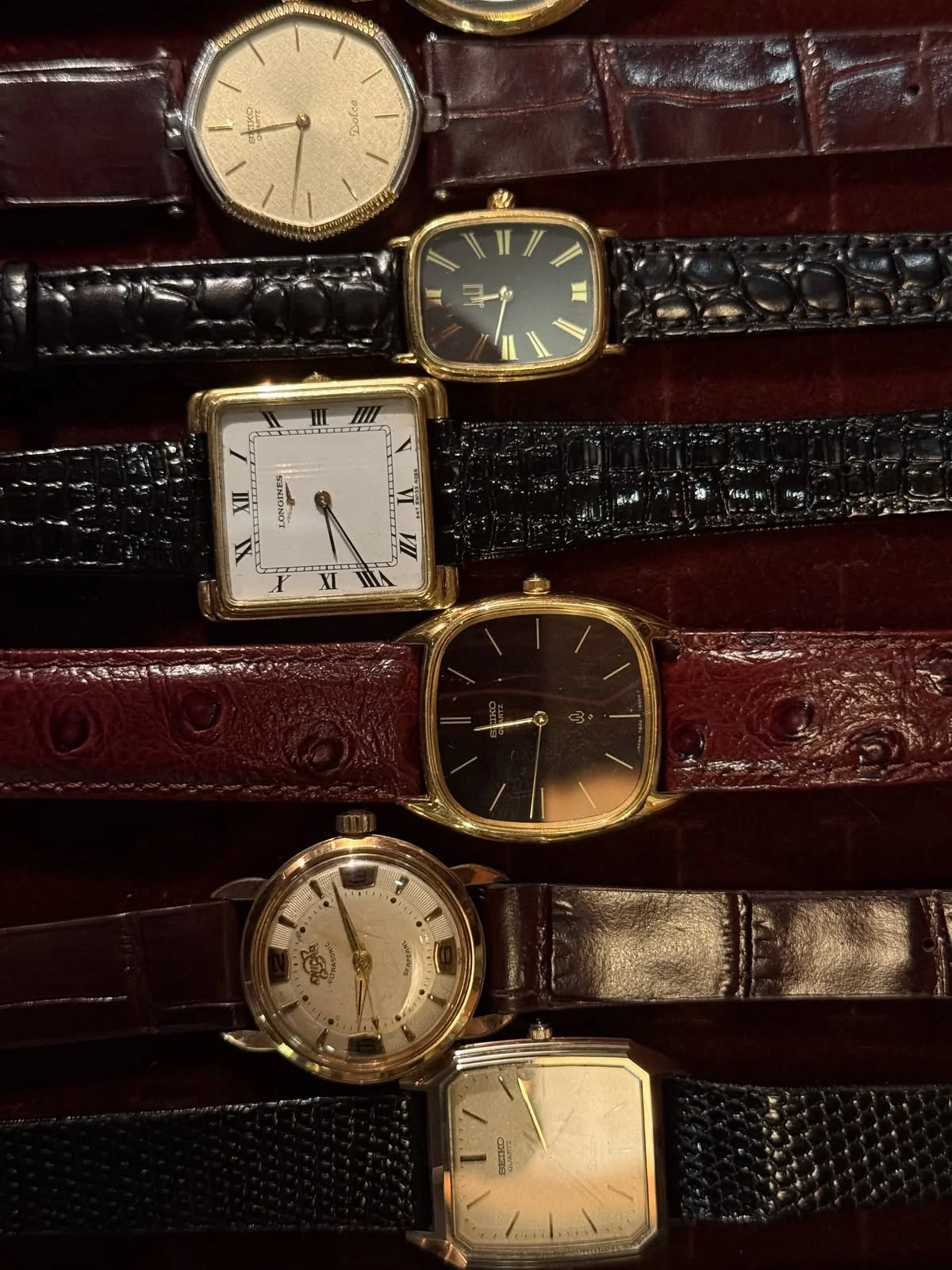 Vintage watches with brown and burgundy leather straps