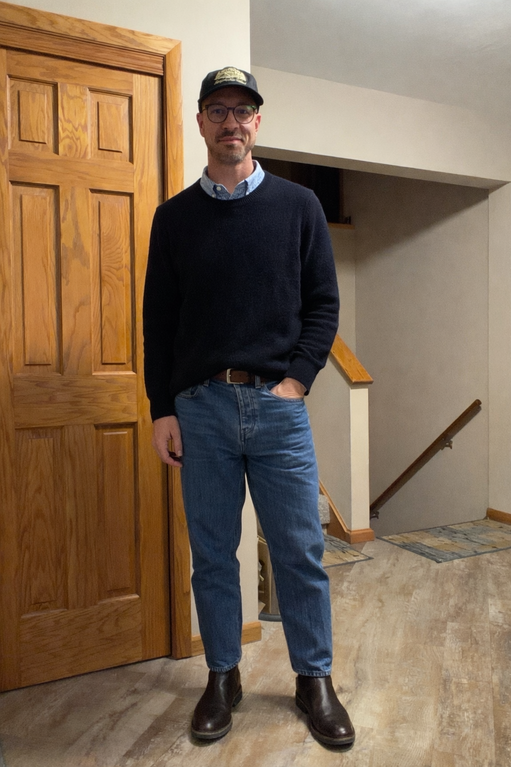 Navy knit with jeans and brown boots