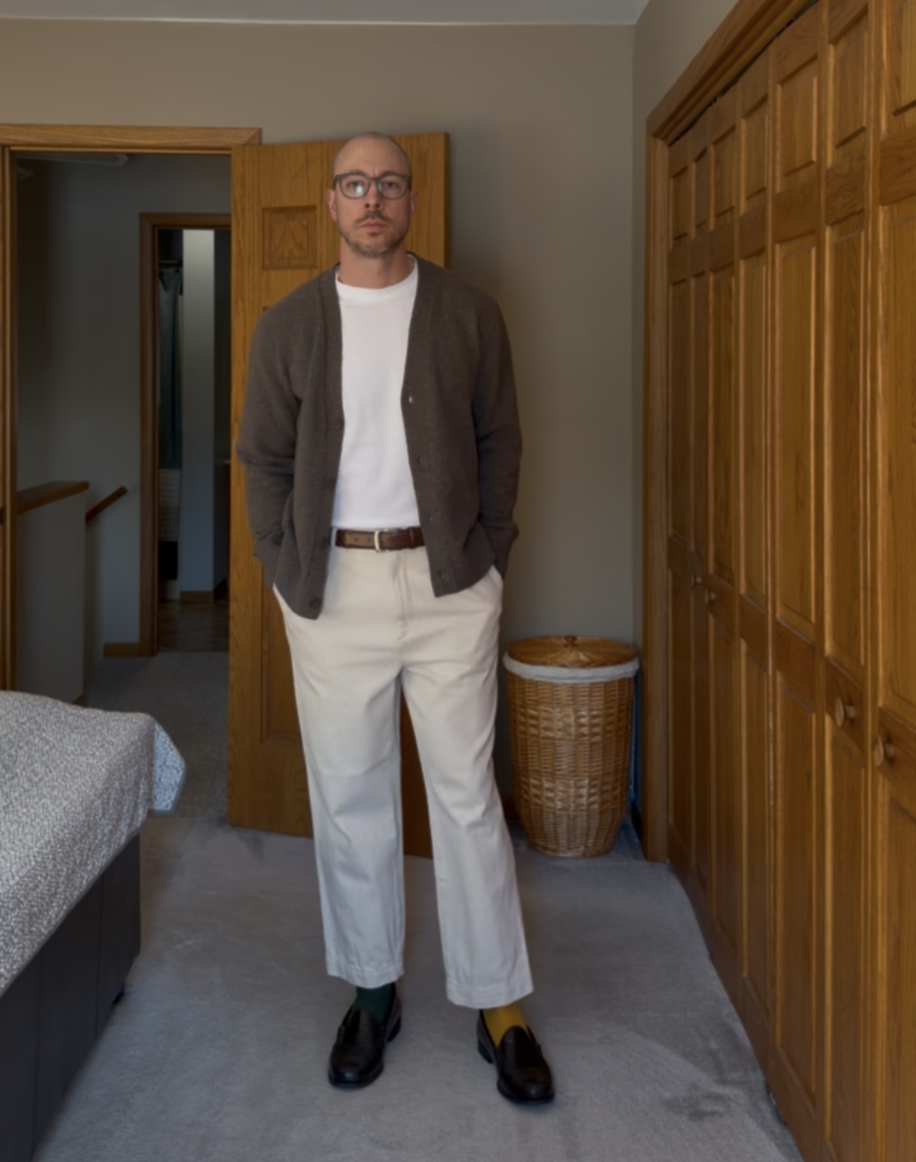 Brown cardigan with cream trousers and loafers