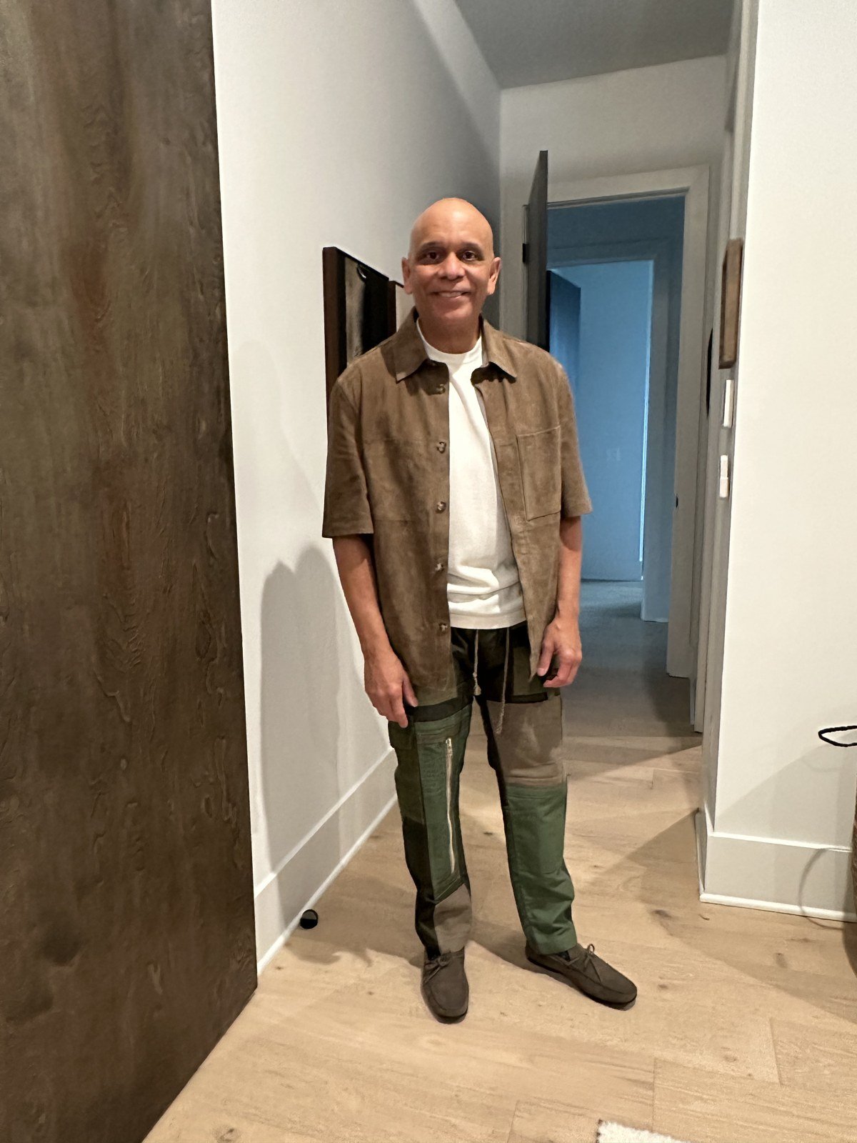 Brown overshirt and white tee styled with olive trousers