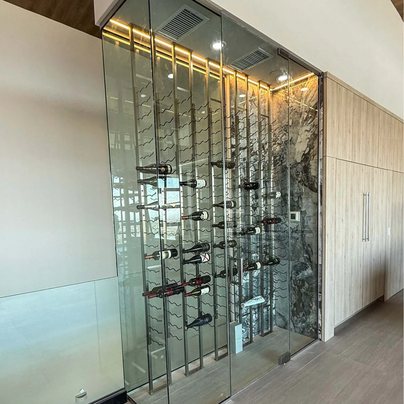 south-facing wine cellar glass showing light damage