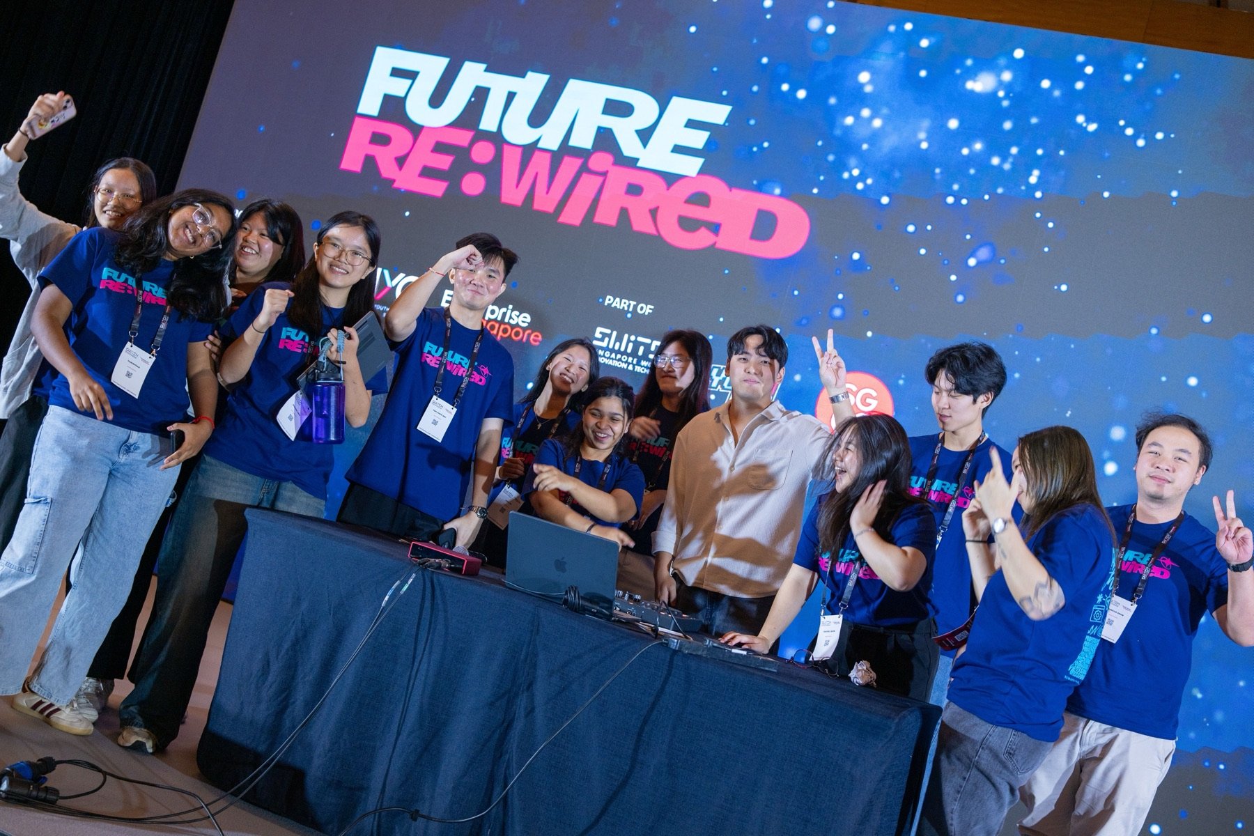 Future Re:Wired organisers and volunteers celebrate on stage
