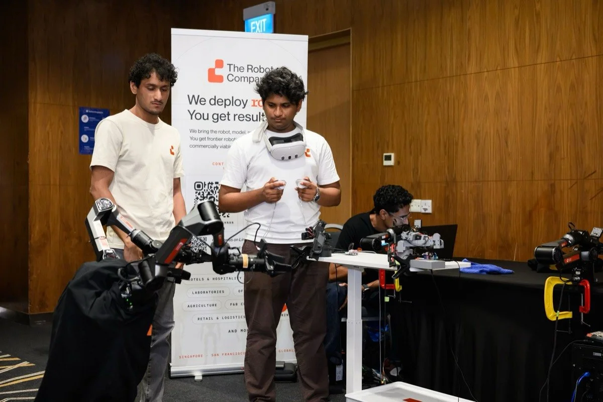 The Robot Company team demonstrates robotics equipment