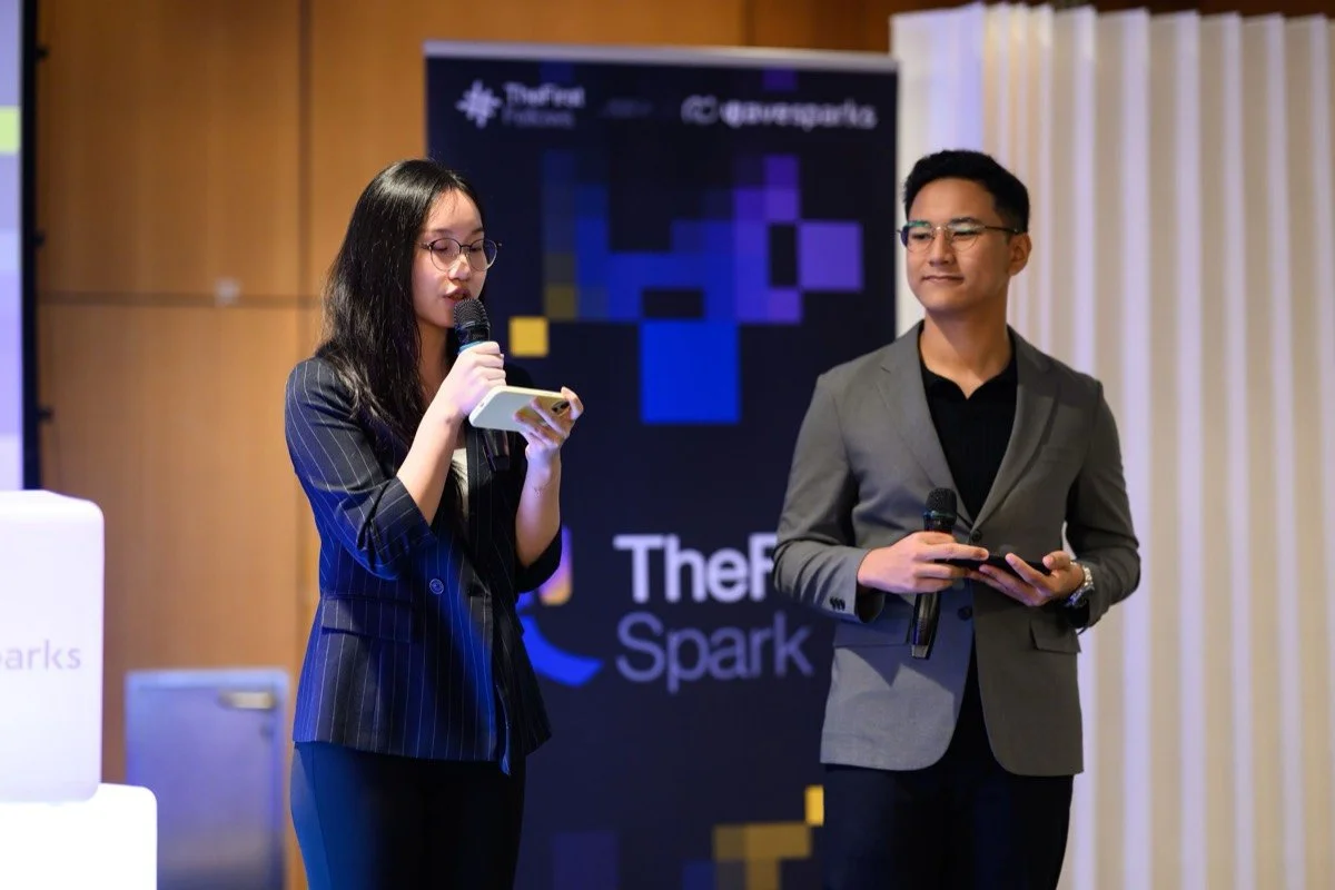 Two event hosts speak on TheFirst Spark stage