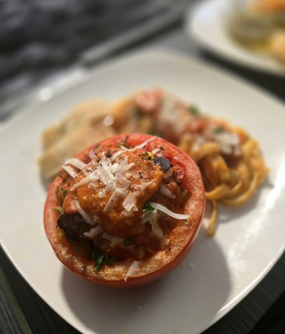 227 stuffed tomato with pasta and grated cheese