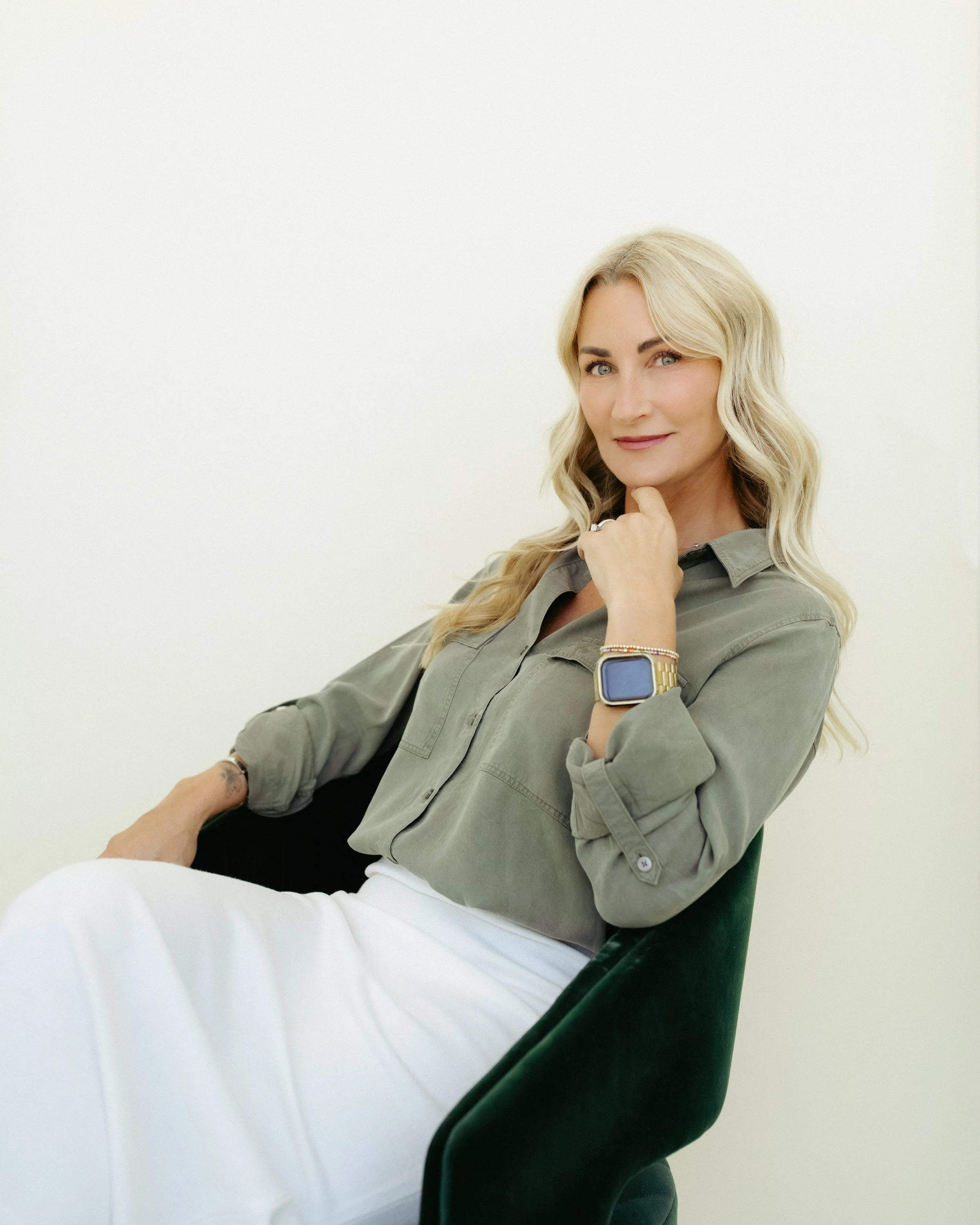 Lisa Iverson sitting and discussing HArmonyCa treatment