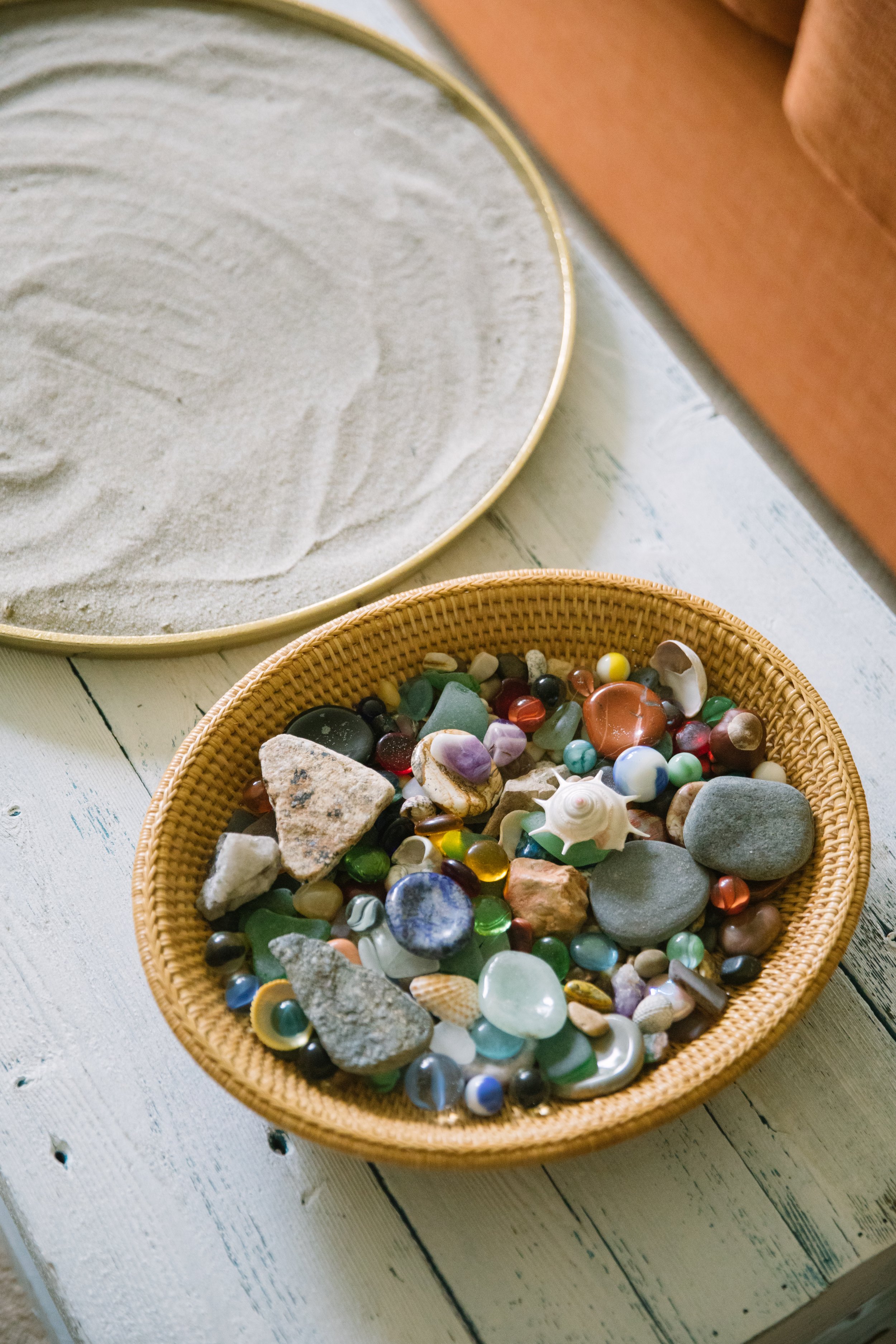 Sand tray and a basket of stones