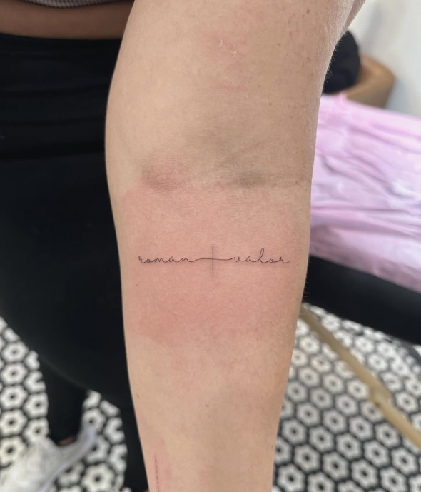 Names and Cross Script fine-line tattoo
