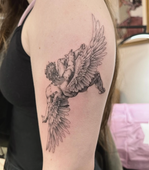 Winged Cherub fine-line tattoo