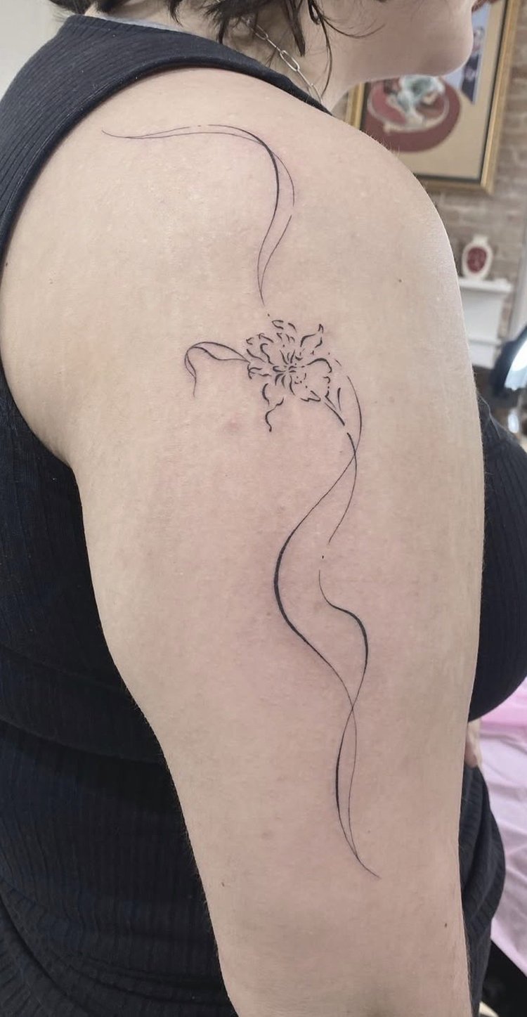 Trailing Bloom fine-line tattoo