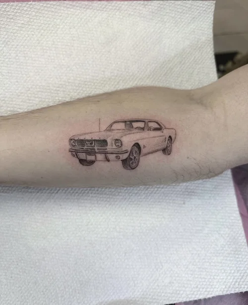 Classic Mustang fine-line tattoo