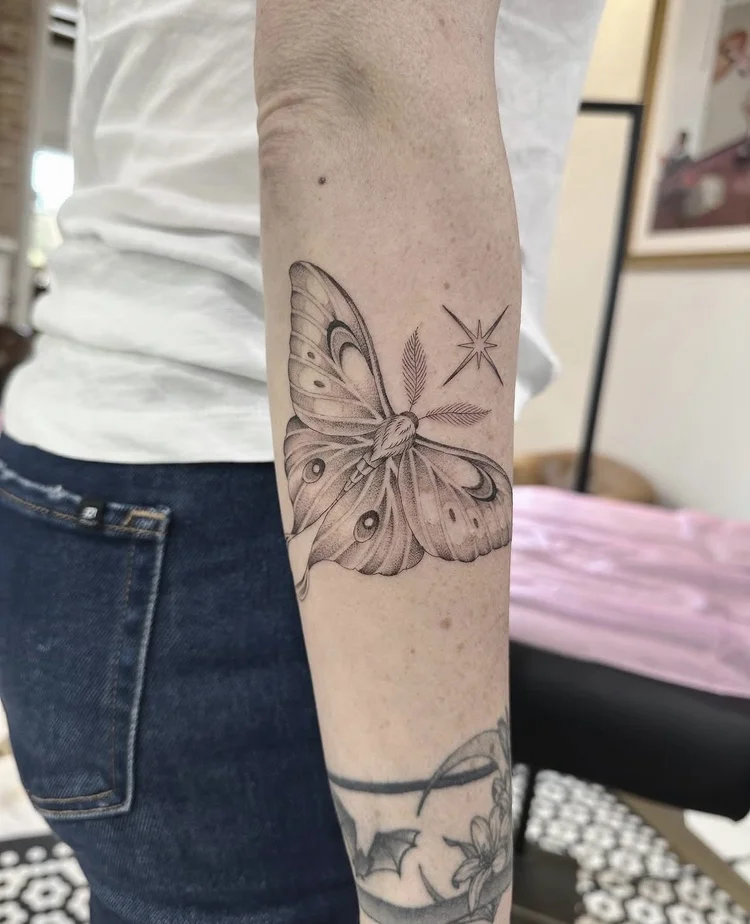 Moth & Star fine-line tattoo