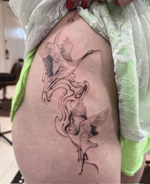 Cranes in Flight fine-line tattoo