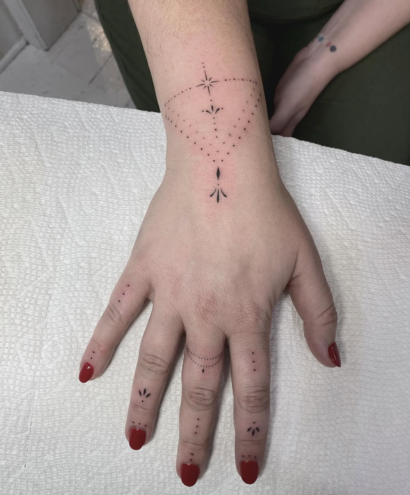 Hand Ornament fine-line tattoo