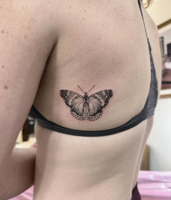 Butterfly fine-line tattoo