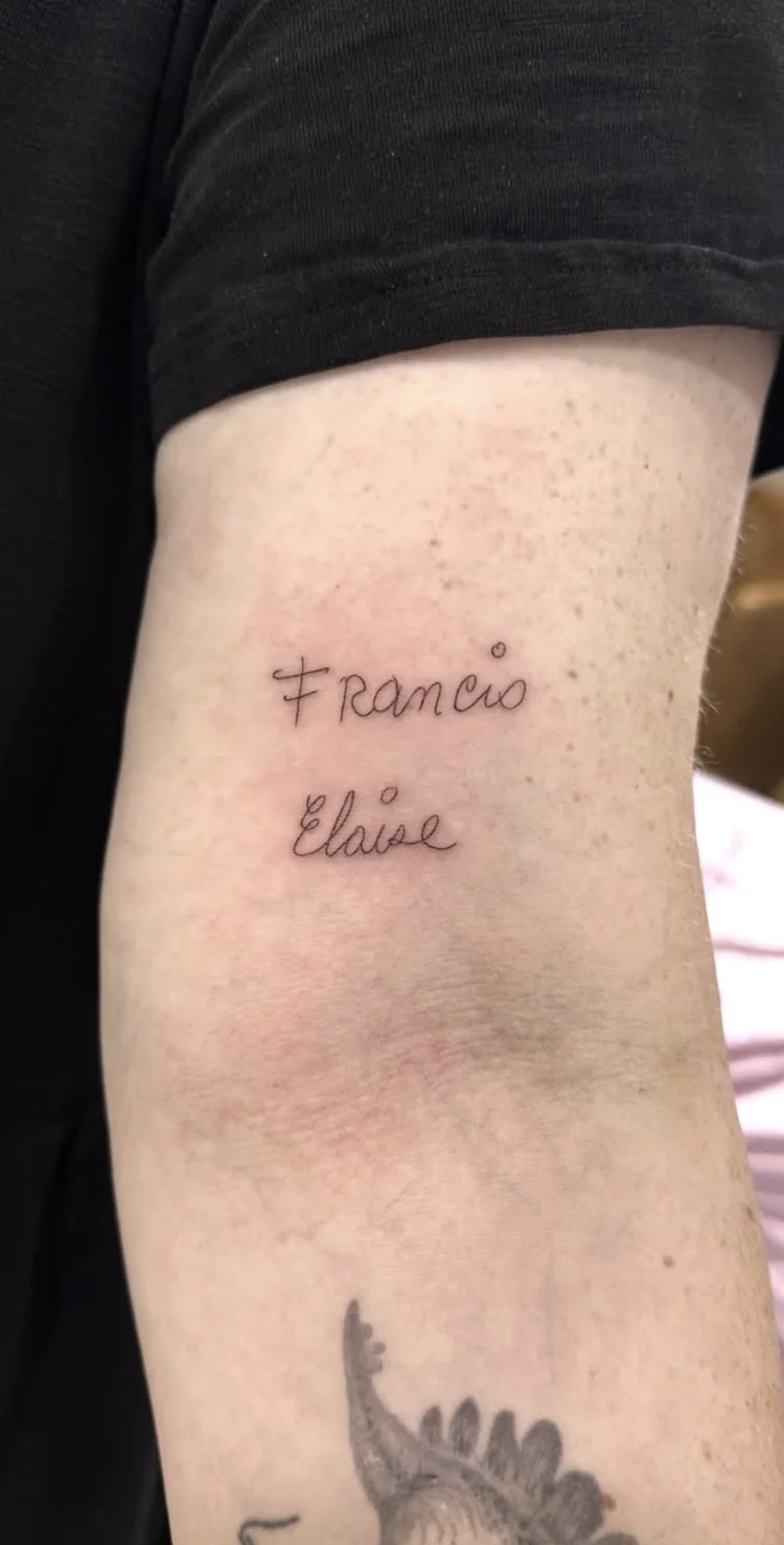 Francis and Elaise fine-line tattoo