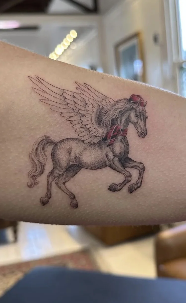 Pegasus fine-line tattoo
