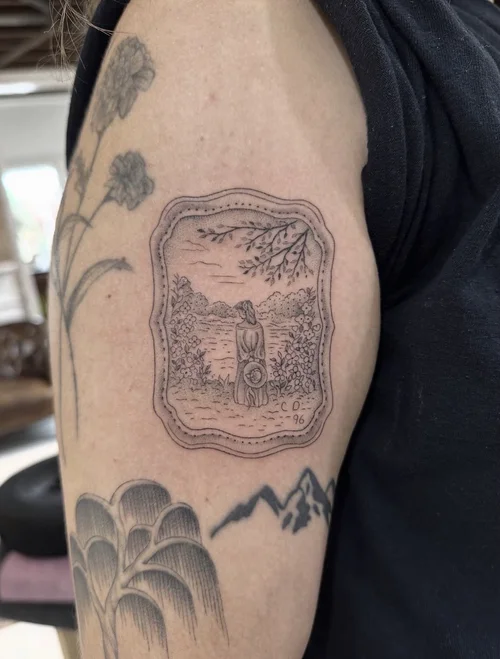 Framed pastoral scene tattoo