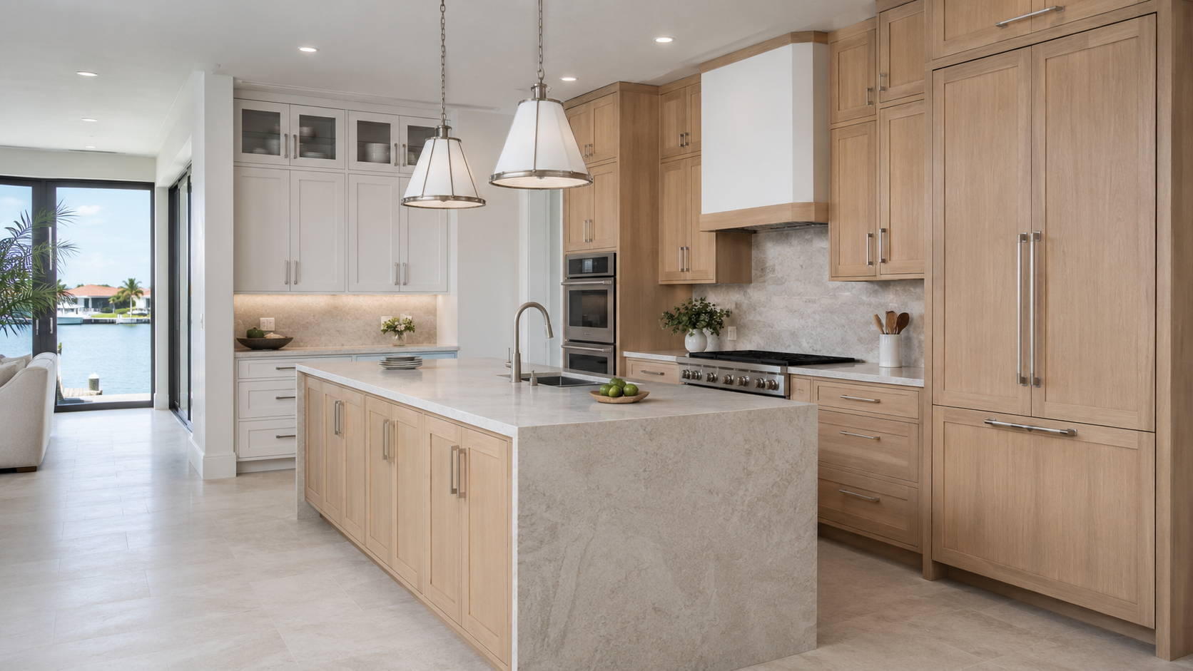 Natural white oak and painted full-overlay cabinetry in a luxury Pinellas County waterfront kitchen