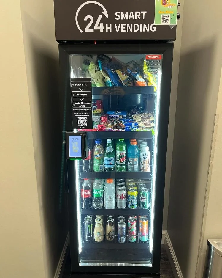 BobbySnaqs installed smart cooler stocked with snacks, sodas, energy drinks and protein shakes
