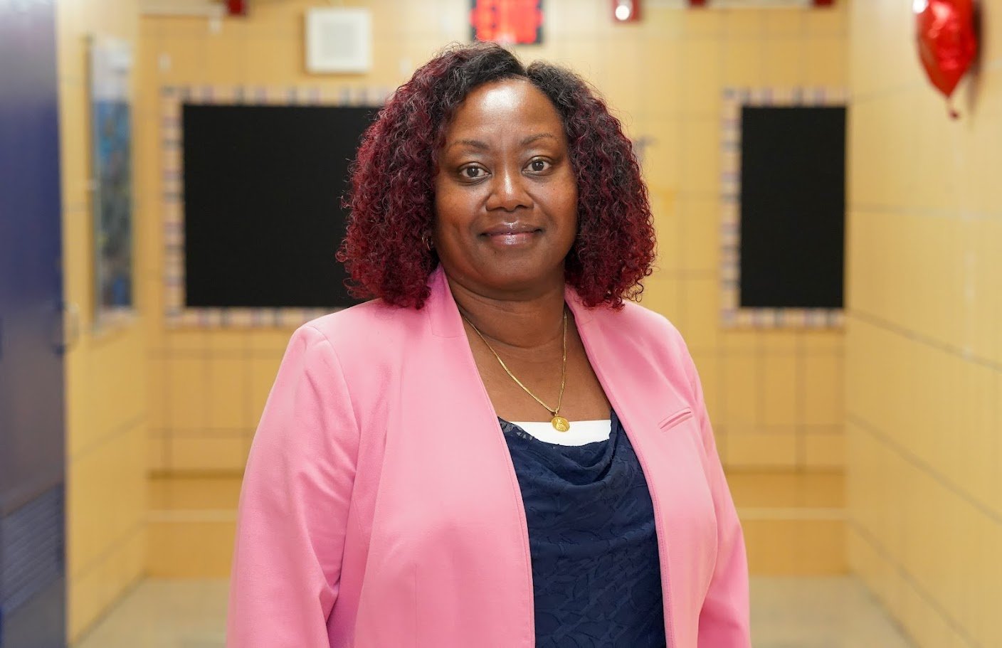 Headshot of H. Perdomo, Assistant Principal, with a professional demeanor.