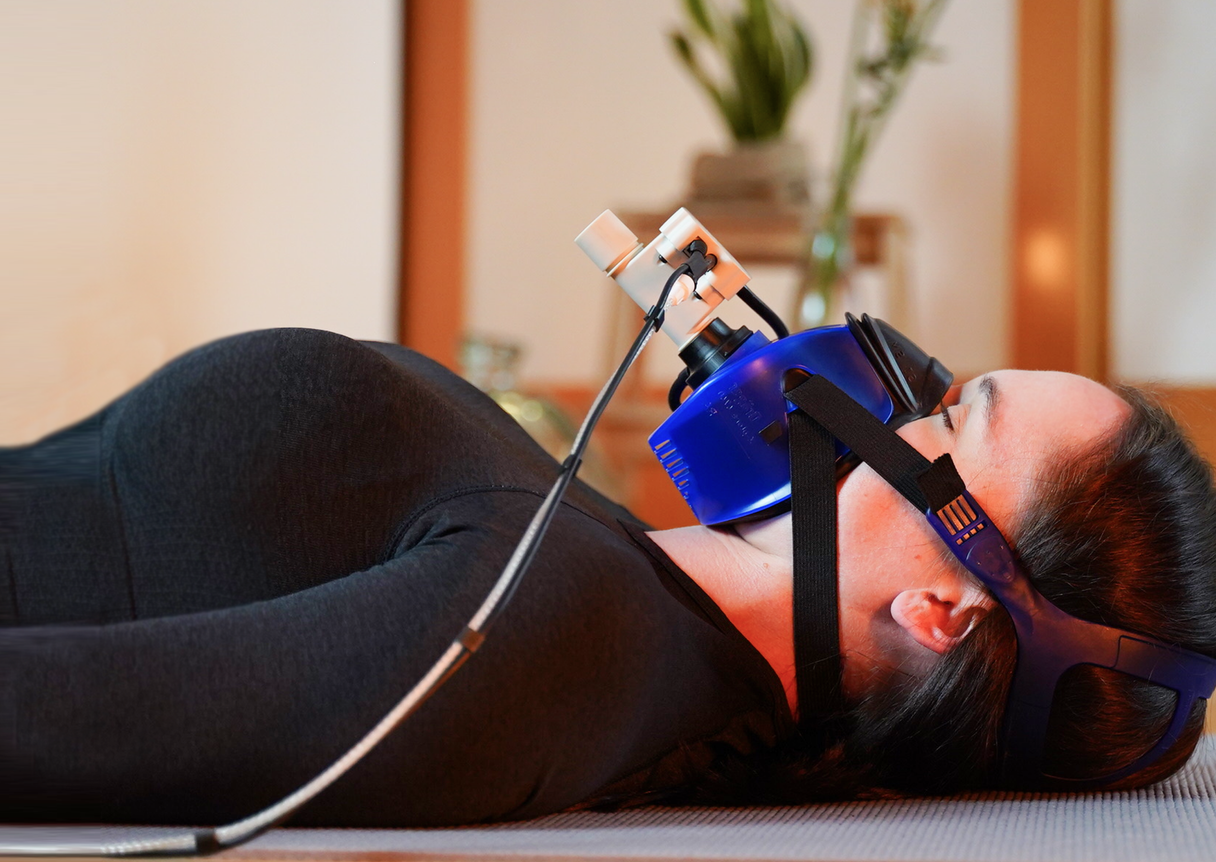 Employee wearing metabolic testing mask