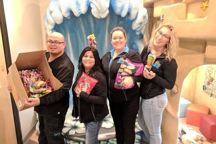 Dental office team with their candy collection