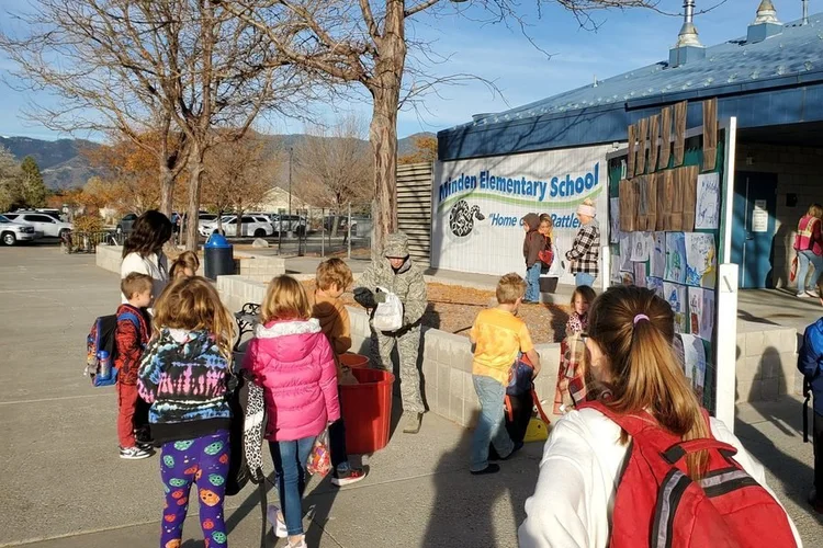 Kids lining up to drop off candy at school