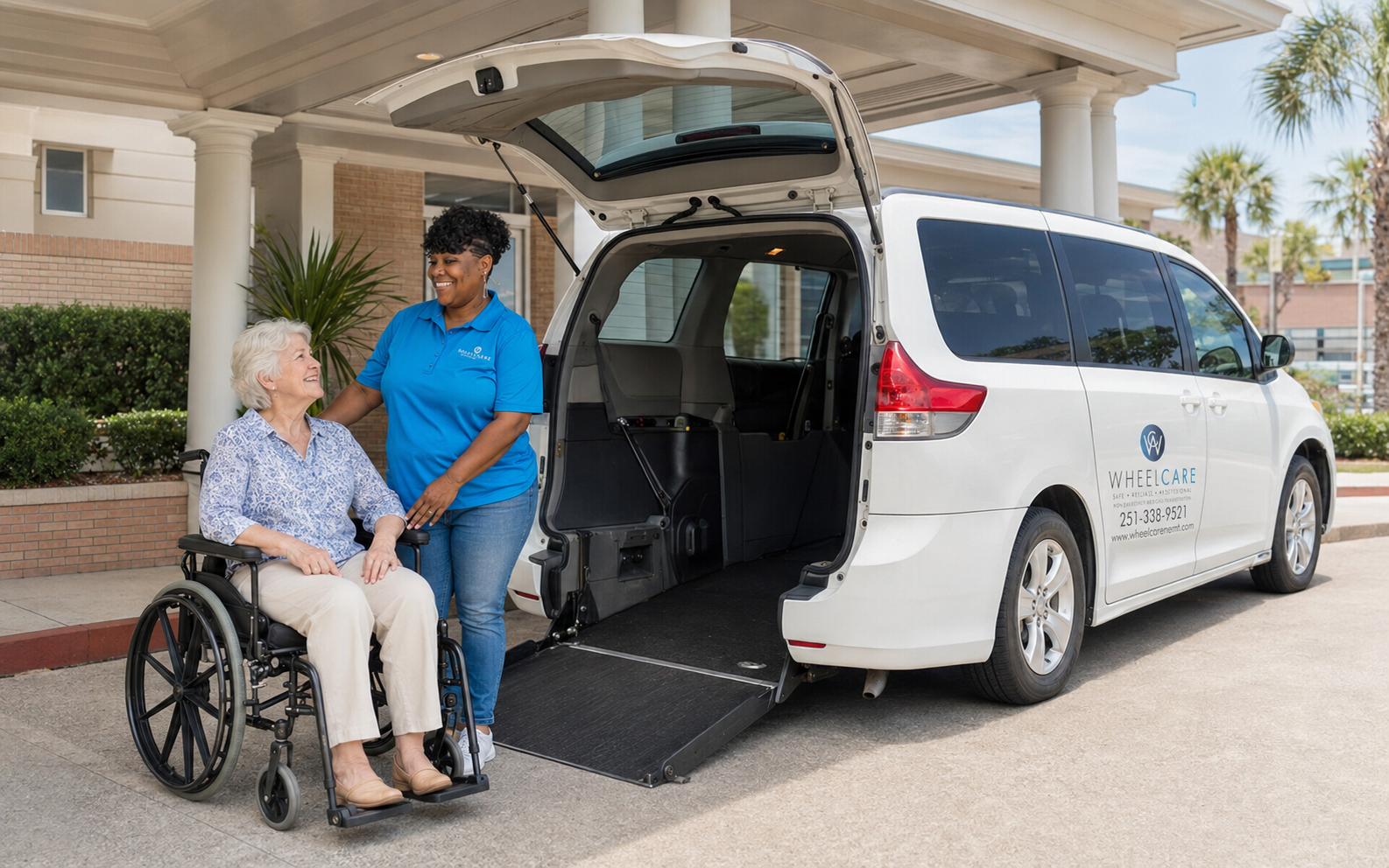 WheelCare driver assisting a wheelchair rider beside an accessible van