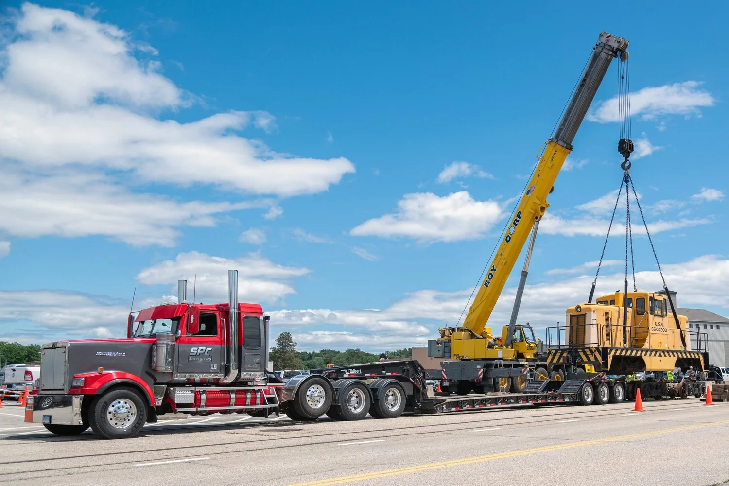 Roy Corp crane lifting a locomotive in North Kingstown, RI
