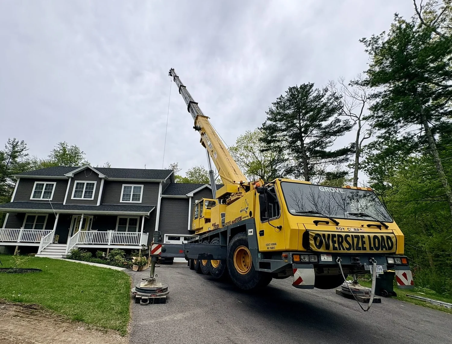 Roy Corp crane on a residential lift in Burrillville, RI
