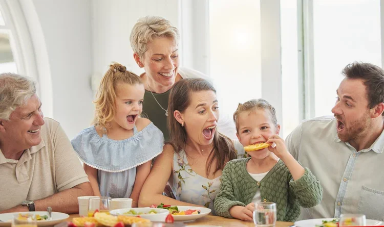 Family sharing a meal while learning about food allergy desensitization
