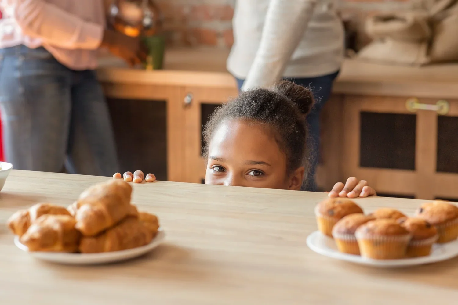Child looking at foods associated with allergy concerns