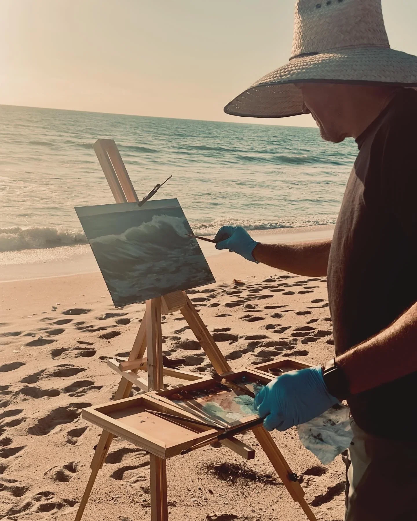 Darryl Swanson painting outdoors
