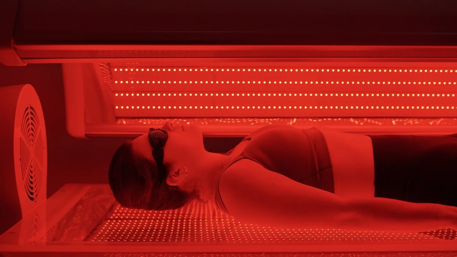 Red light therapy session at Optimum Health