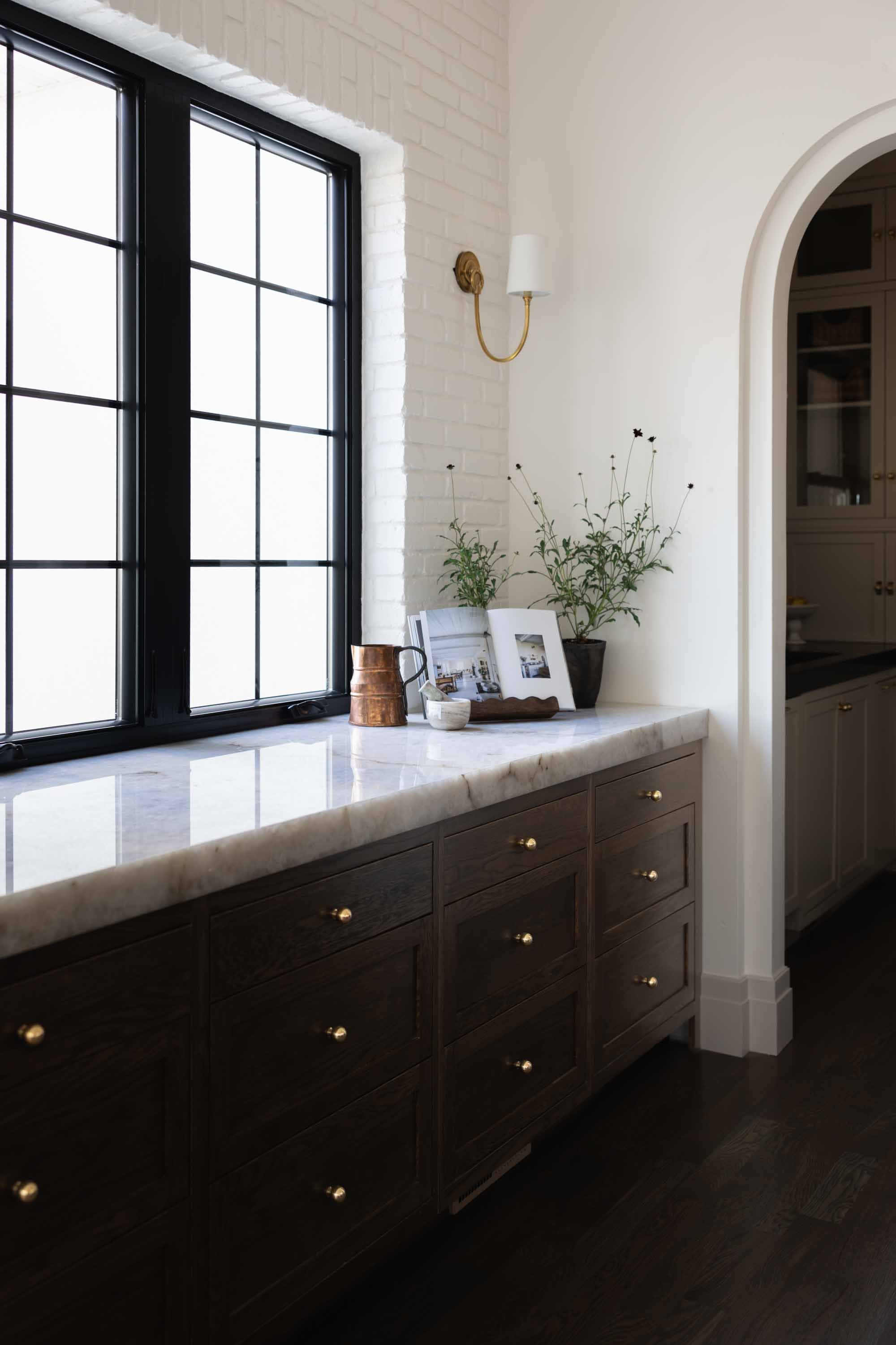 Window seat with black steel windows