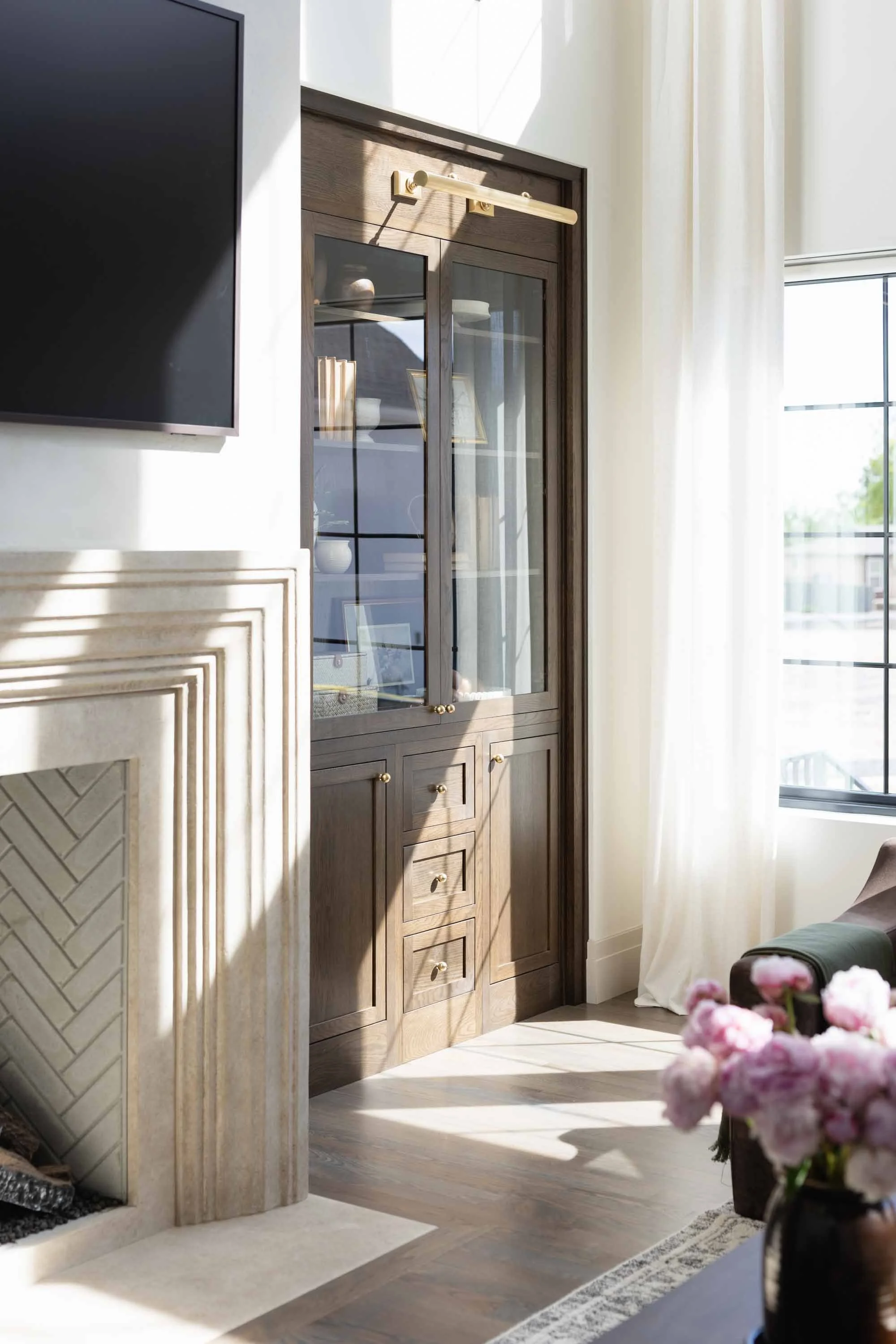 Herringbone chest against sheer curtains