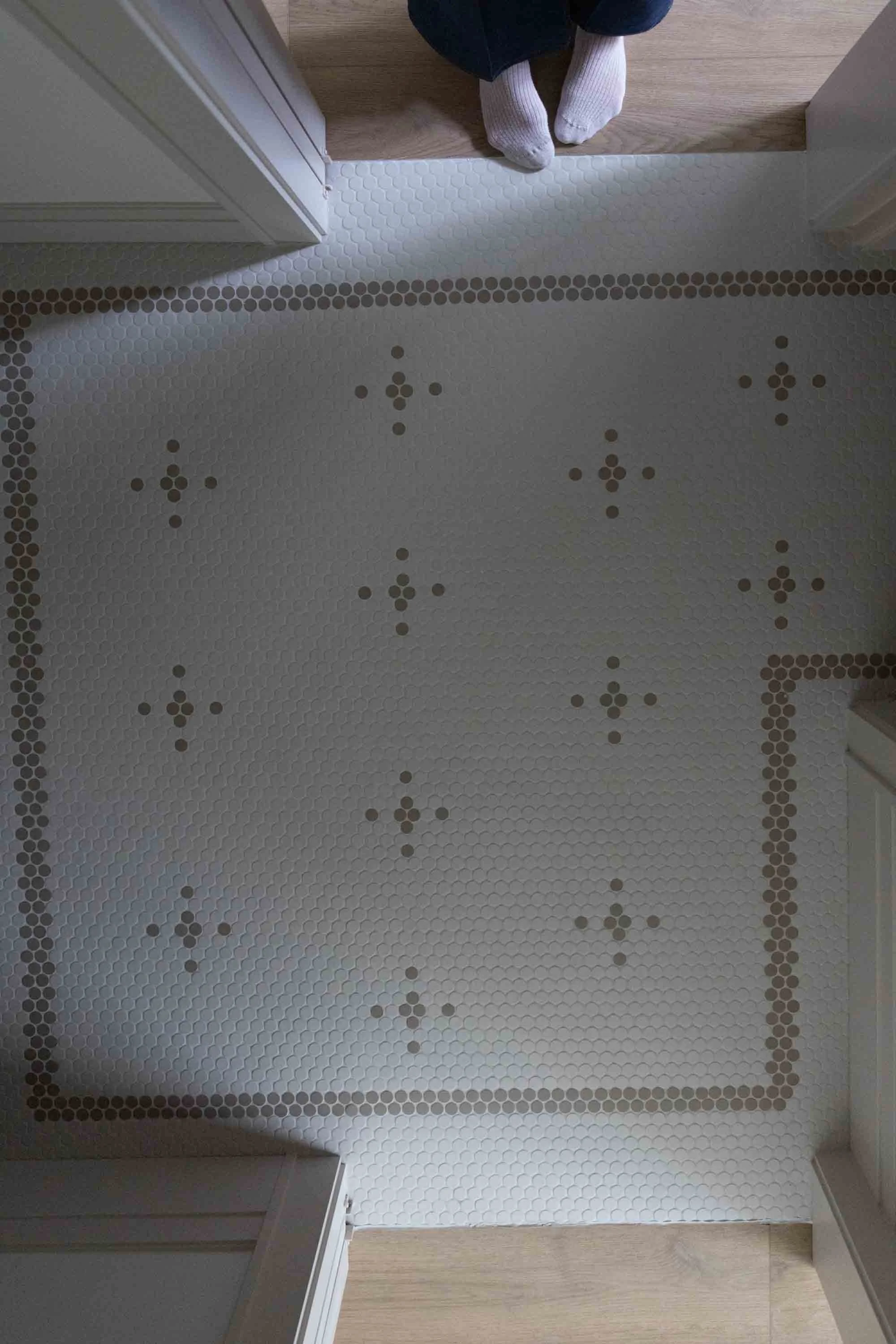 Powder room with a patterned wallcovering