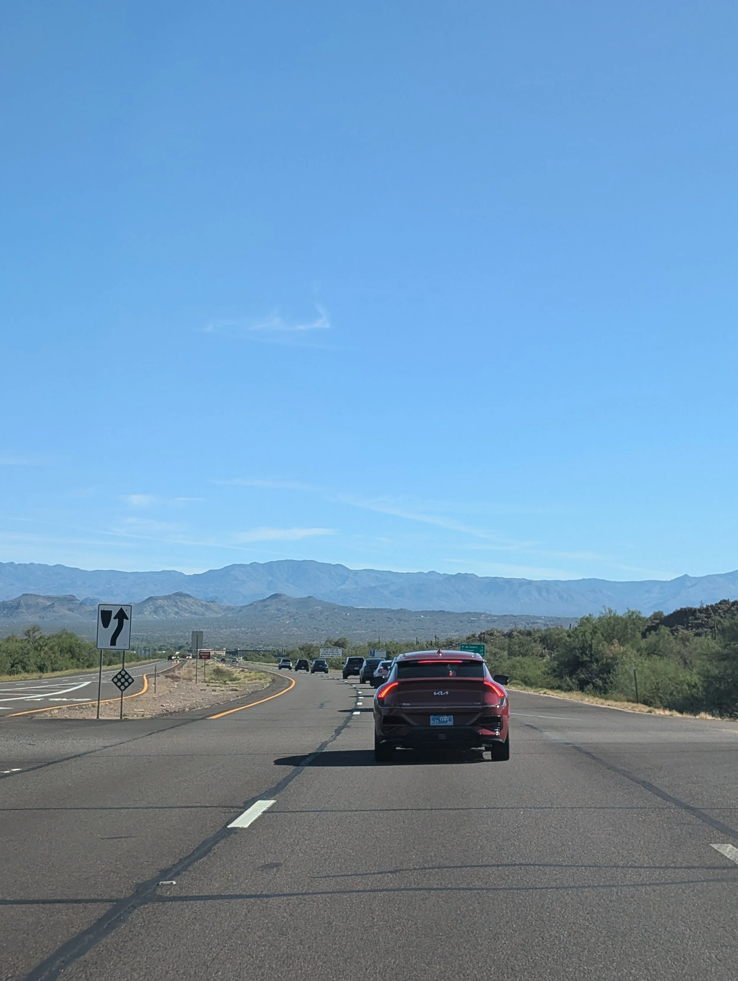 Electric vehicles traveling together on SR-87 from Fountain Hills toward Payson