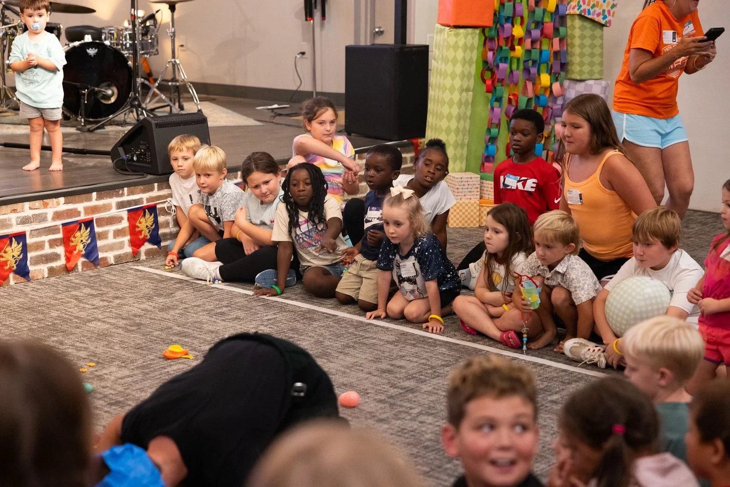 Kids sitting together during kids worship